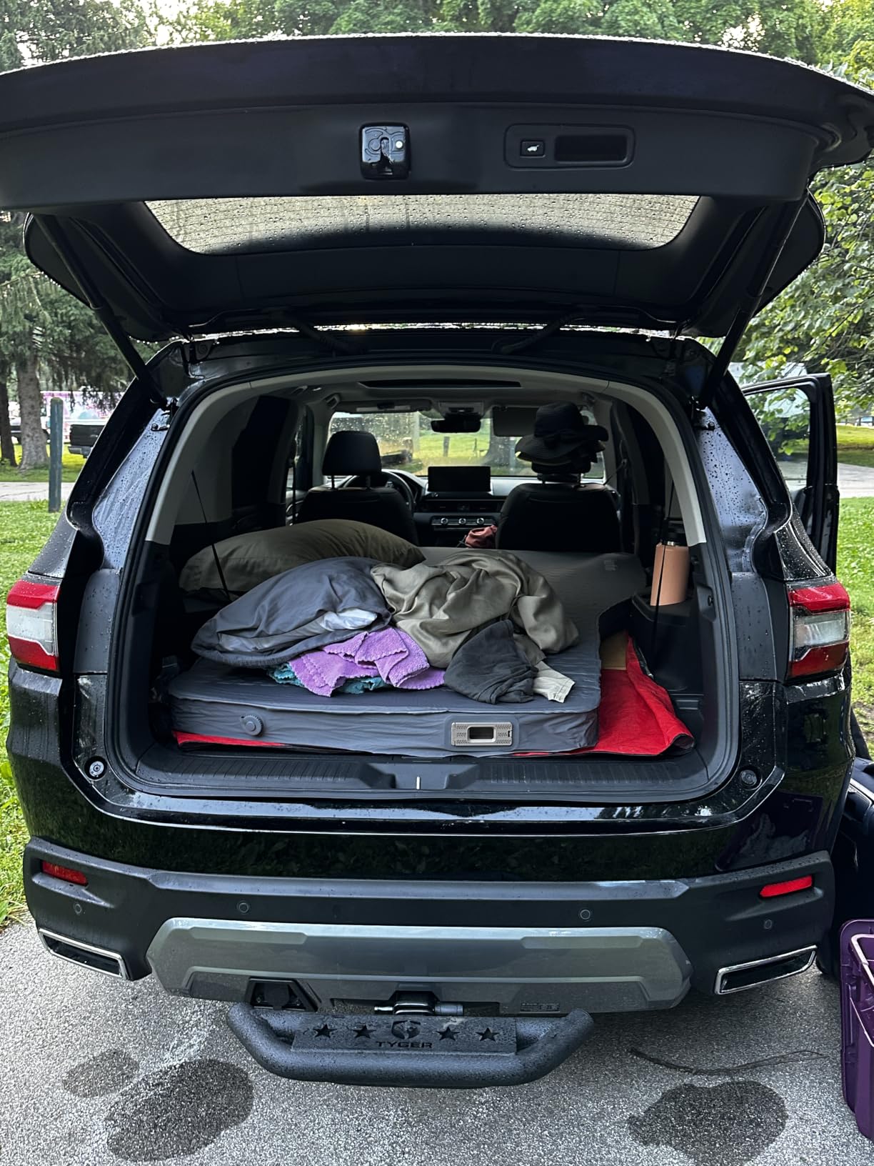 Customer-submitted photo of a vehicle camping setup with a Hikenture mattress